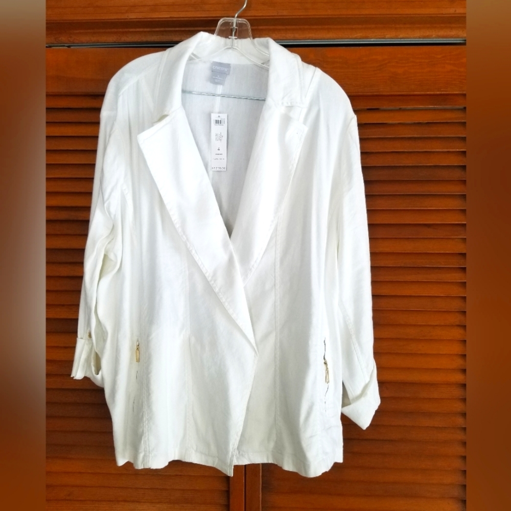 Chico's  white linen jacket never worn. 3/4 sleeve.  Zip pockets. Size 4